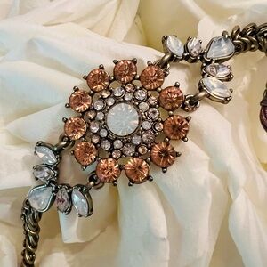 Ornate Crystal Floral Design Bracelet with Bronze Metal and Adjustable Cords